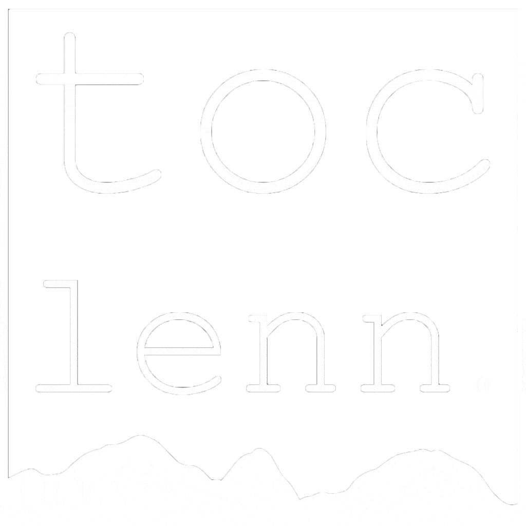 Originales Logo von toclenn. Balmer in Weiss